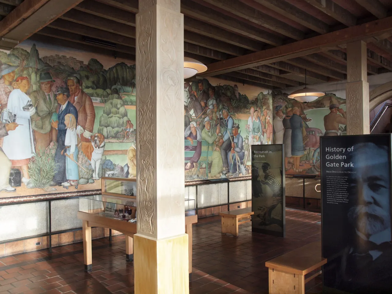Painted frescoes of 1930s San Francisco life covering the walls of the Beach Chalet lobby